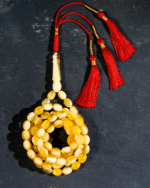 كهرمان طبيعي شاهد و خرز منوصف بياض بالكامل