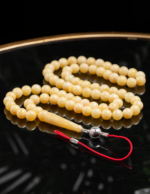 لوقو الخالدي كهرمان طبيعي ابيض محاحي